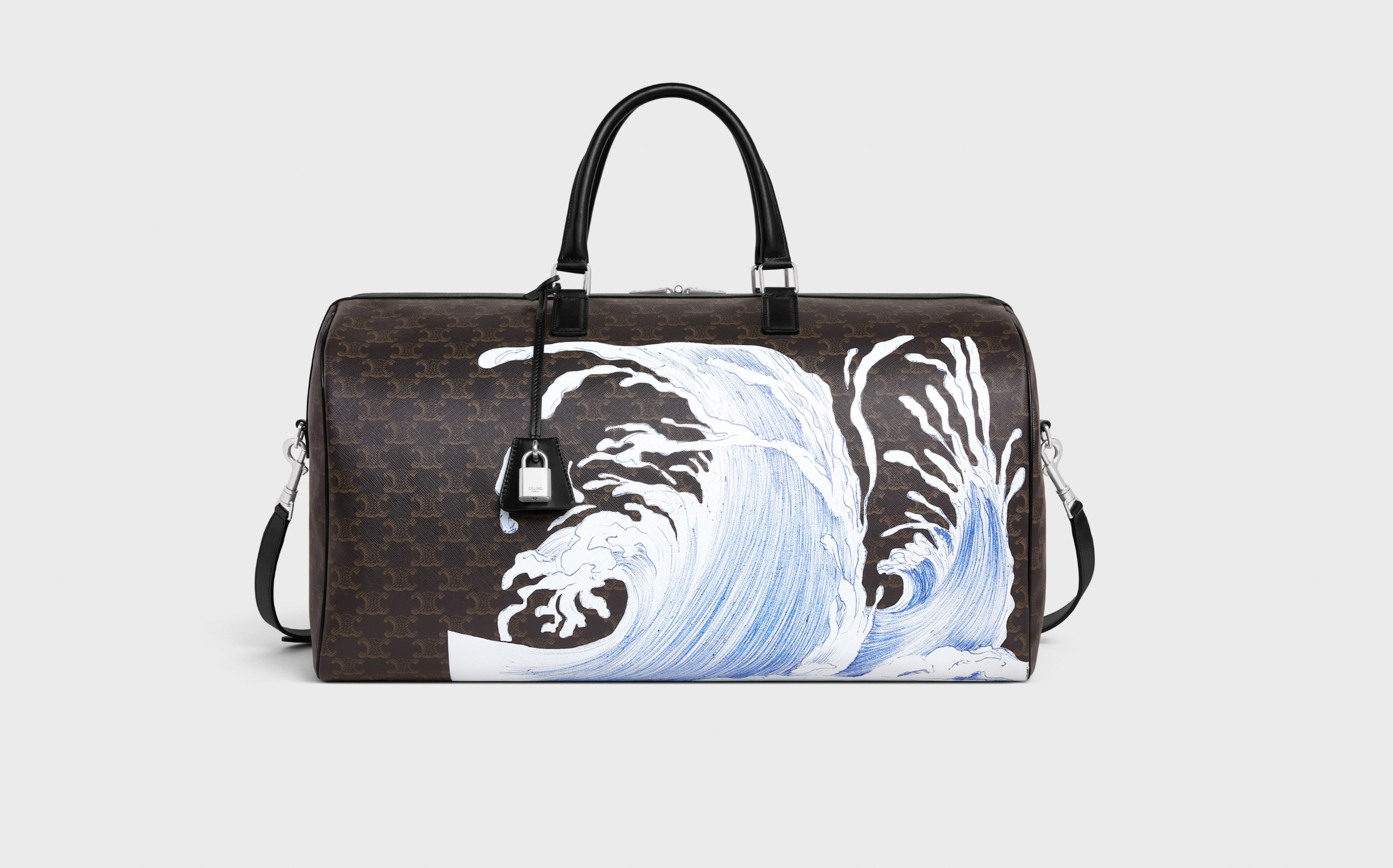 Shop CELINE Large voyage bag in triomphe canvas celine print